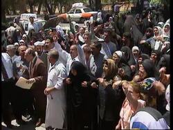 IRAQ: BAGHDAD: CHILDREN'S BURIAL TURNS INTO ANTI-SANCTIONS PROTEST News Clip