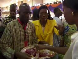 MS Shot of people serving drink to congregation in church / Lagos, Nigeria Stock Footage