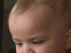 Funny expression of a sweet baby girl Stock Footage