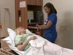 Female nurse testing and talking to pregnant woman Stock Footage