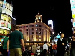 Lit Buildings at Ginza at Night with Waco Department Store, Tokyo, Japan Stock Footage