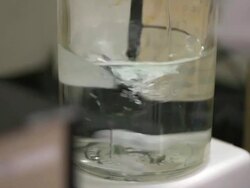 Water Spinning in Scientific Beaker Stock Footage