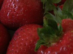 Cu zoom out on strawberry; London Stock Footage