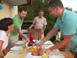 HD CRANE: Family Having Barbecue Birthday Party Stock Footage