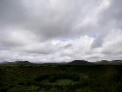 WS T/L View of Yongnunioreum (icelandic volcano in Seogwipo) and Cinder Cone / Seogwipo, Jeju Island, South Korea Stock Footage