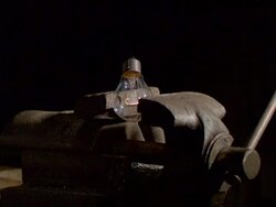 Bulb in exploding vise Stock Footage