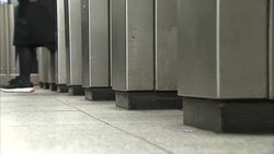 Commuters Passing Through Ticket Barriers News Clip