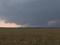 CG forked lightning right of frame under supercell thunderstorm, severe storm, USA Stock Footage
