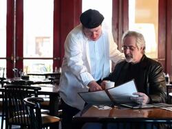 MS PAN Owner of restaurnat talking to chef about menu / Santa Fe, New Mexico, United States Stock Footage