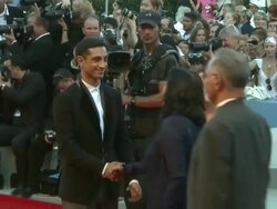 Riz Ahmed, Mira Nira at The Reluctant Fundamentalist Premiere: Opening Ceremony: 69th Venice Film Festival at Sala Grande on August 29, 2012 in Venice, Italy (Footage by WireImage Video/Getty Images) Stock Footage