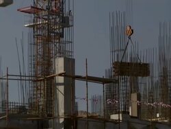 WS TD TU PAN View of  crane cab holding  driver and mechanism rides along crane arm / Muscat, Gorverorate of Muscat, Oman Stock Footage