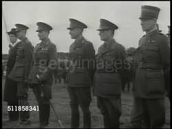 1943: SWEDEN REARMAMENT: WS Swedish Landsverk L-60 light tanks moving over open field, officers standing, looking left. LA MS Light tank passing FG. HEADLINES: Newspapers w/ English titling: Italy Surrenders, Berlin Bombed Again, Russians into Poland. Instructional Video
