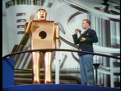 1940 man standing next to robot + talking / New York World's Fair / industrial Stock Footage