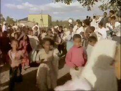 MS Children running through street, Palm Sunday, Ethiopia, Africa Stock Footage