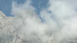 Paraglider flying over the Wilder Kaiser Valley Stock Footage