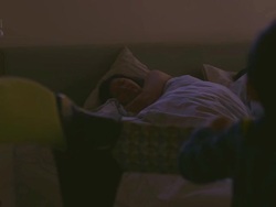 MS Baby standing in crib trying to getting mom's attention, mom waking up and grabbing baby / Los Angeles, California, United States Stock Footage