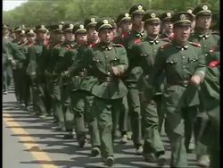 April 27, 1989 FILM MONTAGE MS Police forming barrier in response to Tiananmen Square protest/ Beijing, China/ AUDIO  Stock Footage