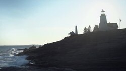 Panoramic shot of Permaquid Point Lighthouse and shore in Maine, USA Stock Footage