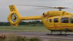 East Anglian Air Ambulance helicopter on runway News Clip