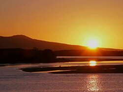 WS Sun rising over Mallacoota Estuary / Mallacoota, Victoria, Australia Stock Footage