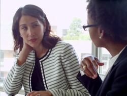MS two businesswomen having project meeting in hotel suite. Stock Footage