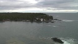 Rocky islands dot a wooded shoreline in Nova Scotia. Stock Footage