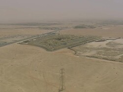 WS AERIAL ZI Shot of buildings construction site at open land in city / Qatar Stock Footage