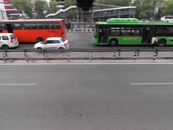 Commuters returning home after a day's work in various modes of transportation from the office areas of Udyog Vihar & Cyber City, Gurgaon Stock Footage