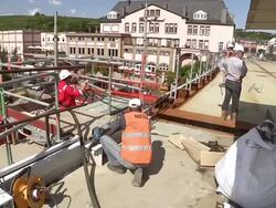 MS Shot of workermen working on bridge at bridge construction / Wellen, river Moselle, Germany Stock Footage