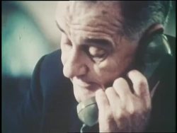 U.S. President Lyndon B. Johnson talks on the telephone in the Oval Office. News Clip