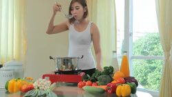 Young woman tasting soup Stock Footage