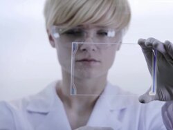 Woman the scientist is analysing structure DNA. Stock Footage