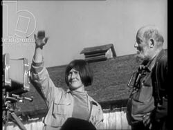 Ansel Adams taking photos on location, working with students and developing pictures in dark room, 1965 Stock Footage