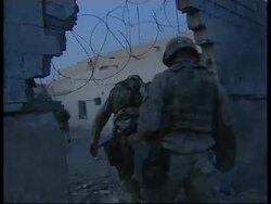 Latest pictures of street fighting from Fallujah; adds comment News Clip