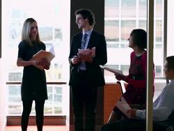 MS PAN R/F Group of coworkers in discussion in conference room while looking at chart on monitor/Washington, USA Stock Footage
