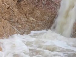 Swiftly flowing water in the soil niche. Stock Footage