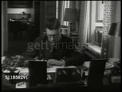 1943: STOCKHOLM, SWEDEN: WS Royal Palace on the Stadsholmen (city island) in Old Town. Crown Prince Gustav VI Adolf working at desk. WS City Hall. MS Fountain statue. Instructional Video