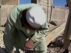 CU TU TD View of carpenter working / Mausa Qala, Helmand Province, Afghanistan.   Stock Footage