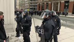 Riot police and protesters on Washington streets News Clip