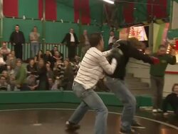 Game "Teufelsrad" and audience watching boxing people Stock Footage