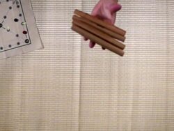 MS SLO MO Shot of Playing Yut (Traditional korean game where players throw four designated wooden stick to gain point and travel across a map) / Seoul, South Korea Stock Footage