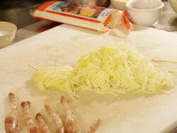 MS Prawn dish preparation at a kitchen grating potato / Sao Paulo, Brazil Stock Footage
