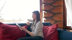 Woman using a digital tablet. Stock Footage