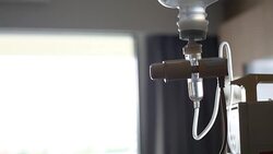 Infusion bottle with IV solution to help patient Stock Footage