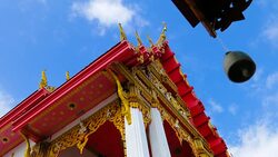 Bell against Wind with Thai Style Temple Background Stock Footage