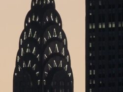 Extreme CU of the top of the Chrystler Building as the lights go out. Stock Footage