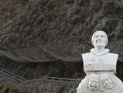 Aci Castello, view of the Giacinta Pezzana monument in front of the castle Stock Footage