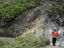 WS Miner carrying solid sulfur / Ijen, Java, Indonesia Stock Footage