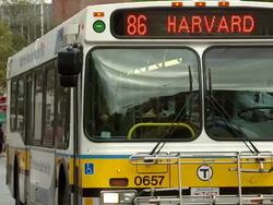 MS POV Public bus begins to moved on street AUDIO / Cambridge, Massachusettes, United States Stock Footage