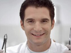 HD DOLLY: Dentist Showing Dental Tools Stock Footage